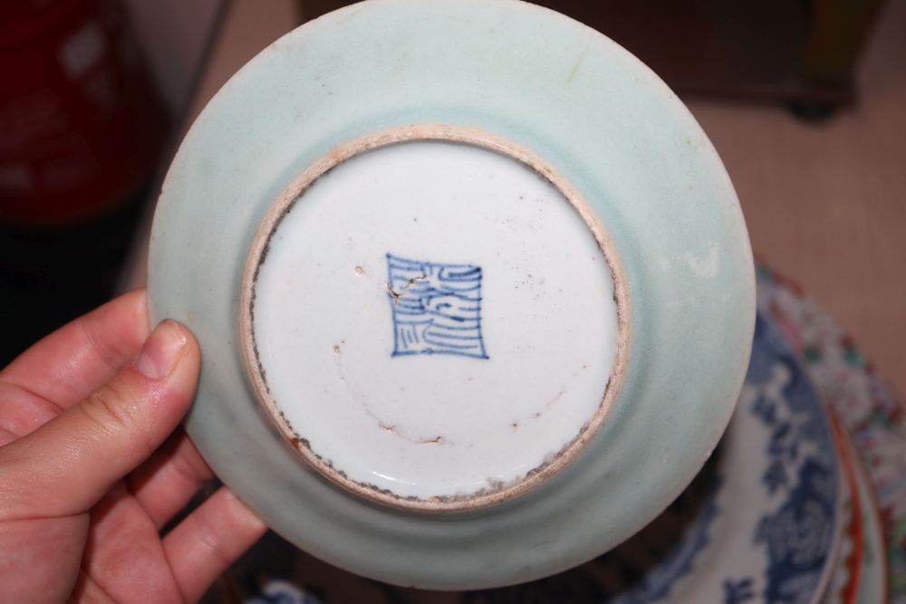 A collection of Oriental chargers and plates,